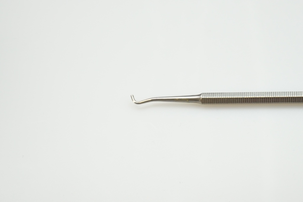 Nosič amalgamu s křížovým řezem