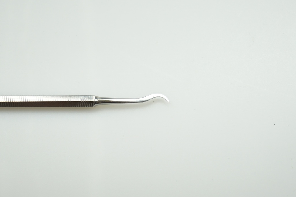 Srpek na zubní kámen